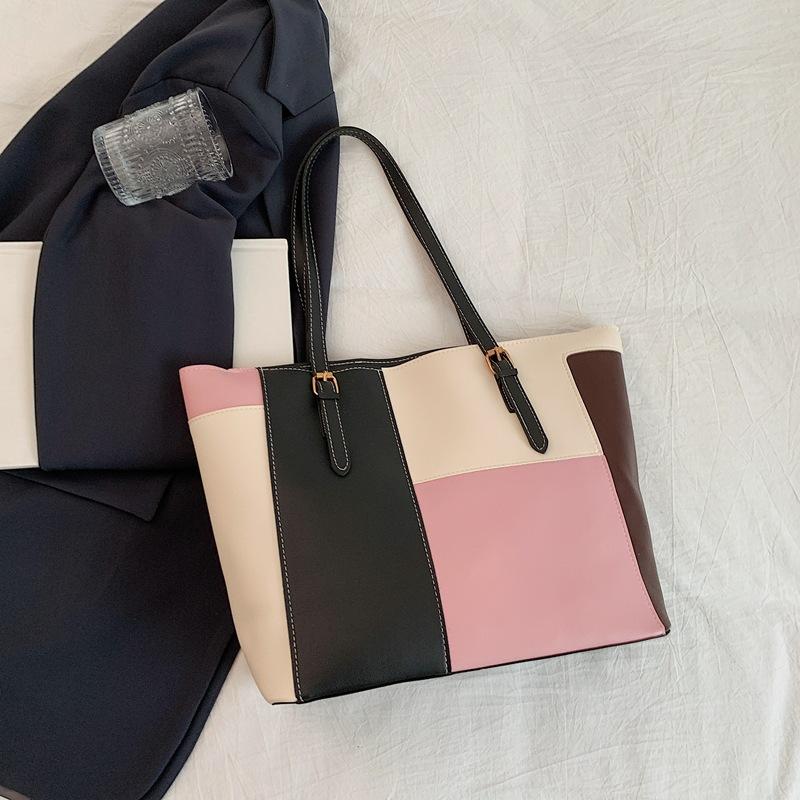 

Big bag women s new trendy fashion large capacity simple shoulder splicing contrasting color tote bag handbag рожевий