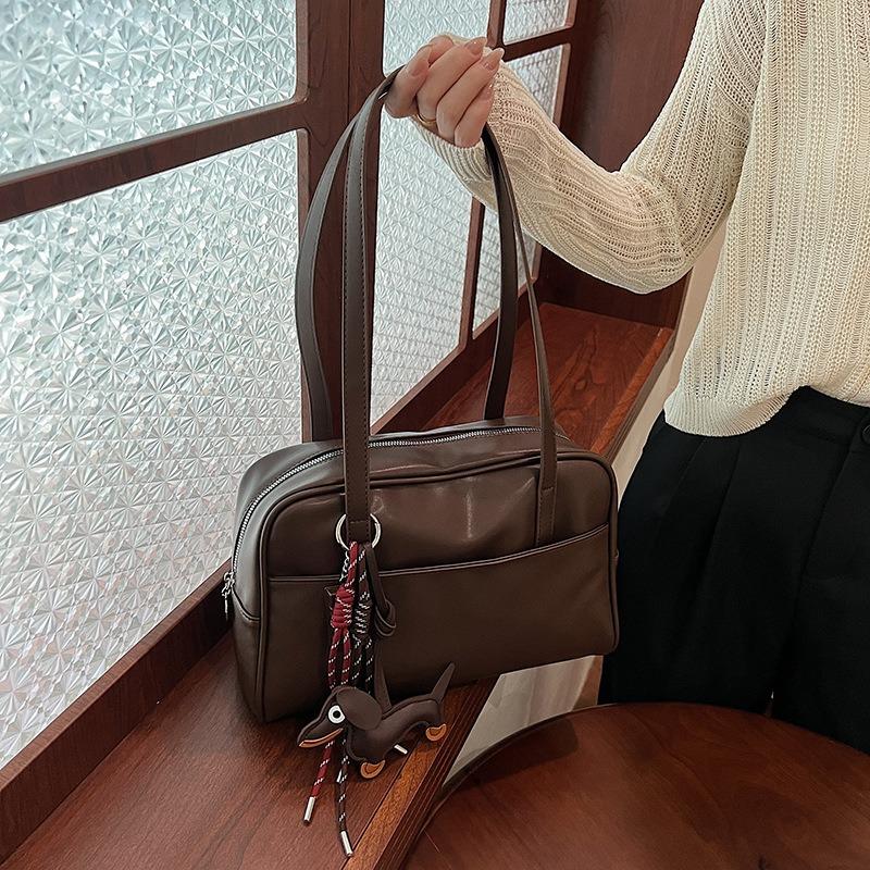 Simple bowling bag women's new large-capacity retro commuting design single shoulder pillow bag