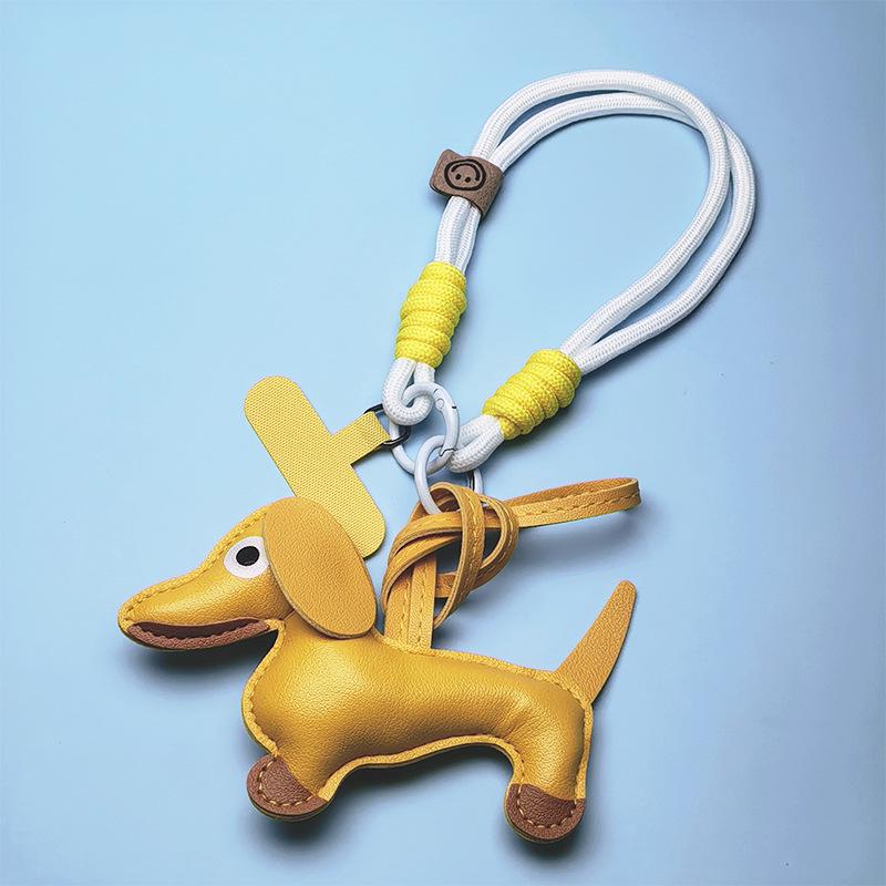 Breloc Piele Teckel Pui & Șnur Telefon