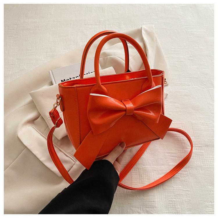 Trendy Butterfly Knot Women s Mini Bag 2024 Spring New Simple Color Collision Handbag оранжевый