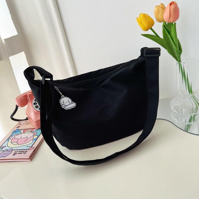 Kleine verse meisjes schoudertas effen kleur grote capaciteit schoudertas eenvoudige mode casual messenger bag dumpling tas