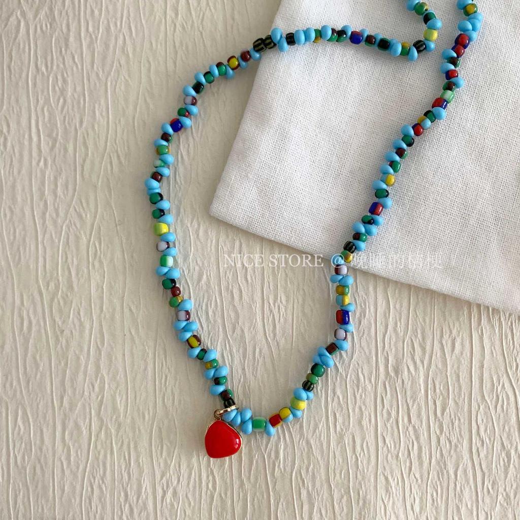 Retro Ethnic Heart Necklace: Wooden Flower Pendant Sweater Chain for Women