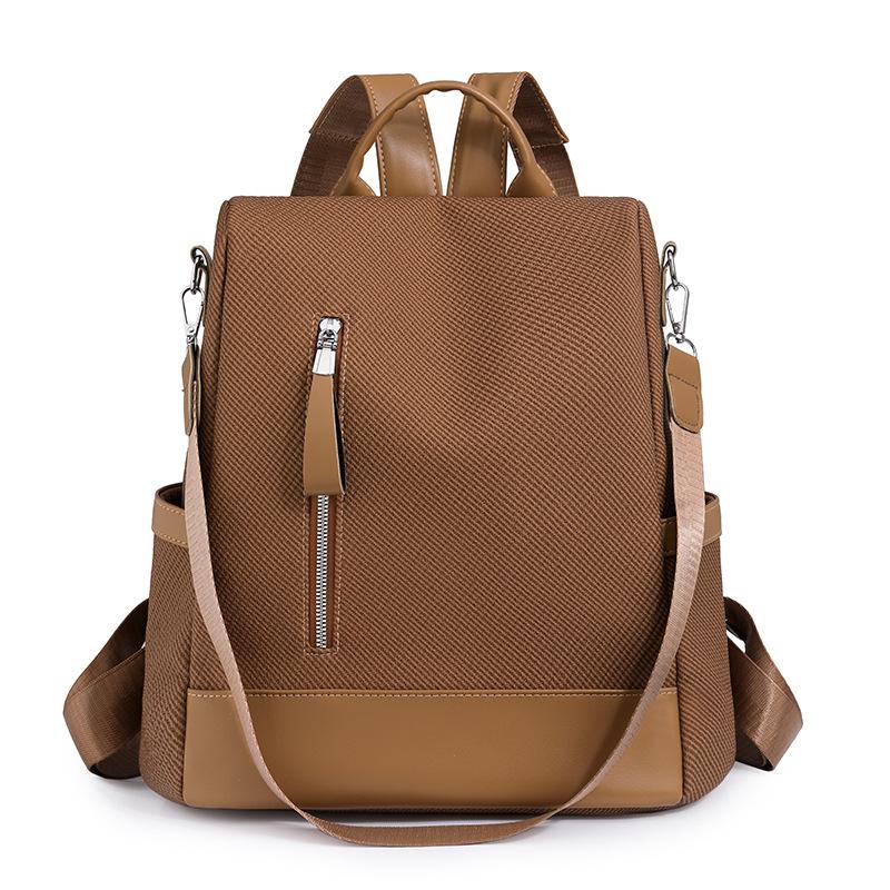 Schoolbag backpack women pu fabric texture commuting large capacity waterproof travel anti-theft backpack niche retro Baigou bag