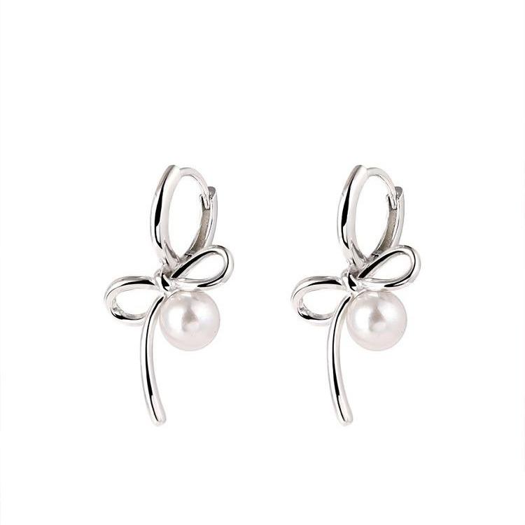 Silver Bow and Pearl Earrings: Elegant, Luxurious, Versatile Women's Accessories