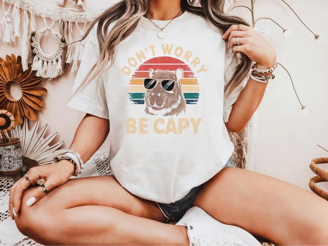 Youre Either a Smart Fella or a Fart Smella Shirt Funny Cowboy Capybara Pun Tee Hilarious Animal Meme Graphic Tee S