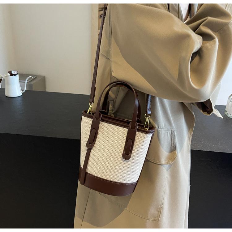 1 szt. 2025 Wybuchowa kontrastowa torba typu wiadro damska uniwersalna torba na ramię do pracy w mieście prosta torba premium wiatrówka