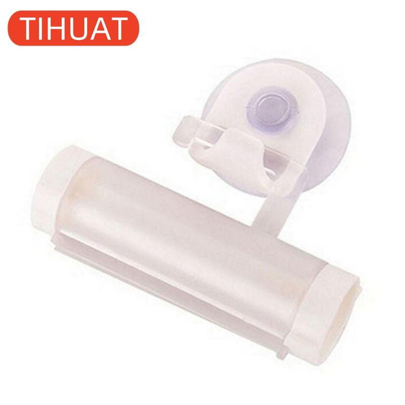 Plastic Device - A Suction Cup Press for Convenient Storage and Uniform Squeezing of Toothpaste Tubes