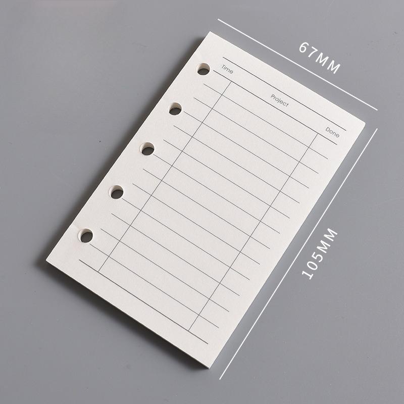 Die Innenseite des M5 Notizbuchs Die leere vertikale Linie des A8 Loseblatt-Kernquadrats und der Wochenplan Eine Seite pro Tag zum Eintragen