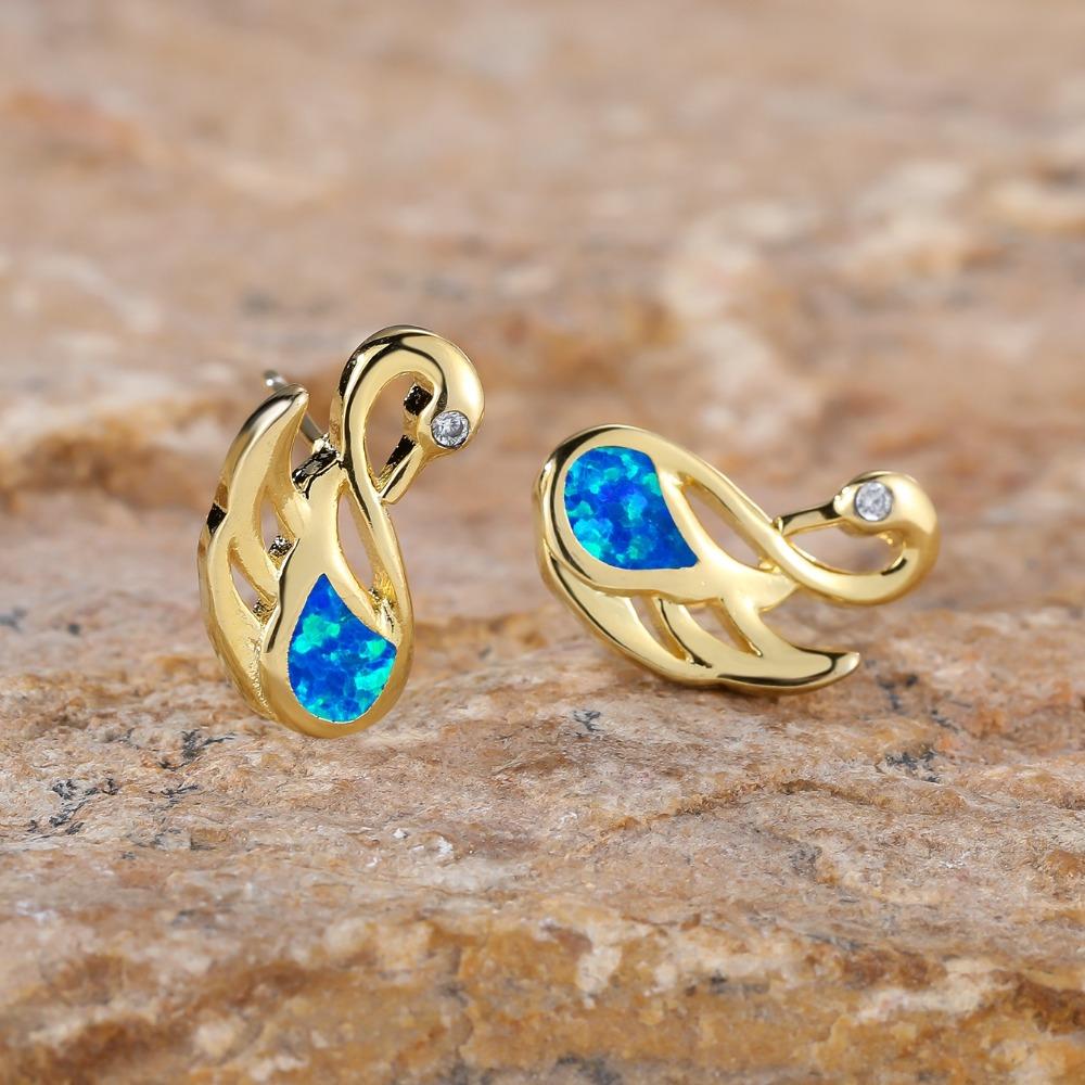 Модные серьги-лебеди с кристаллами циркона — фото 7