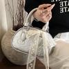 Korean high-end sense sweet wind simple cute embossed portable Boston bag casual versatile foreign style messenger bag women
