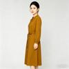 Waist cinching temperament long sleeved mid length skirt