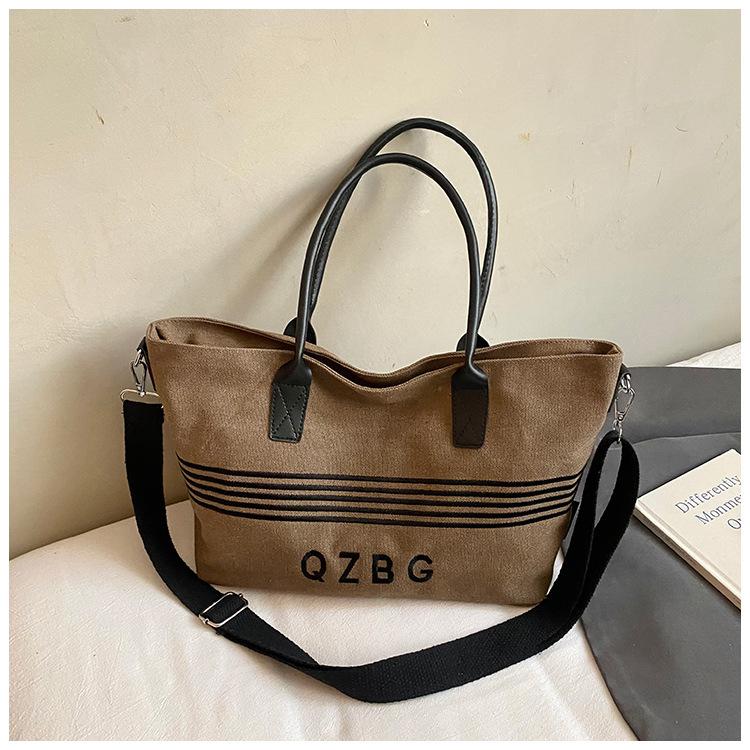 

2025 new large-capacity canvas tote bag Korean version retro striped shoulder messenger bag commuter tote bag коричневий
