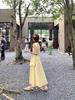 Send a small backpack, design jewelry, pure and gentle yellow dress, women's summer round neck waist and thin a-word long dress