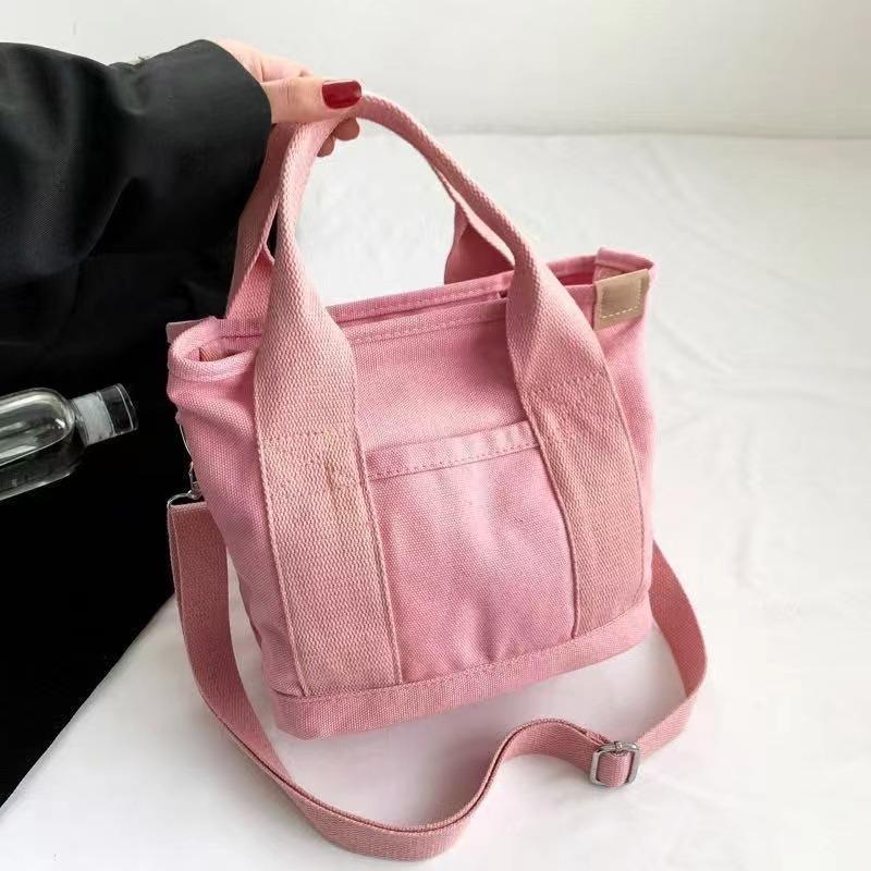 

ins wind contrasting color women s canvas bag, trendy brand wide shoulder strap tote bag, new versatile casual environmental protection bag Width 25cm, thickness 16cm, height 22cm