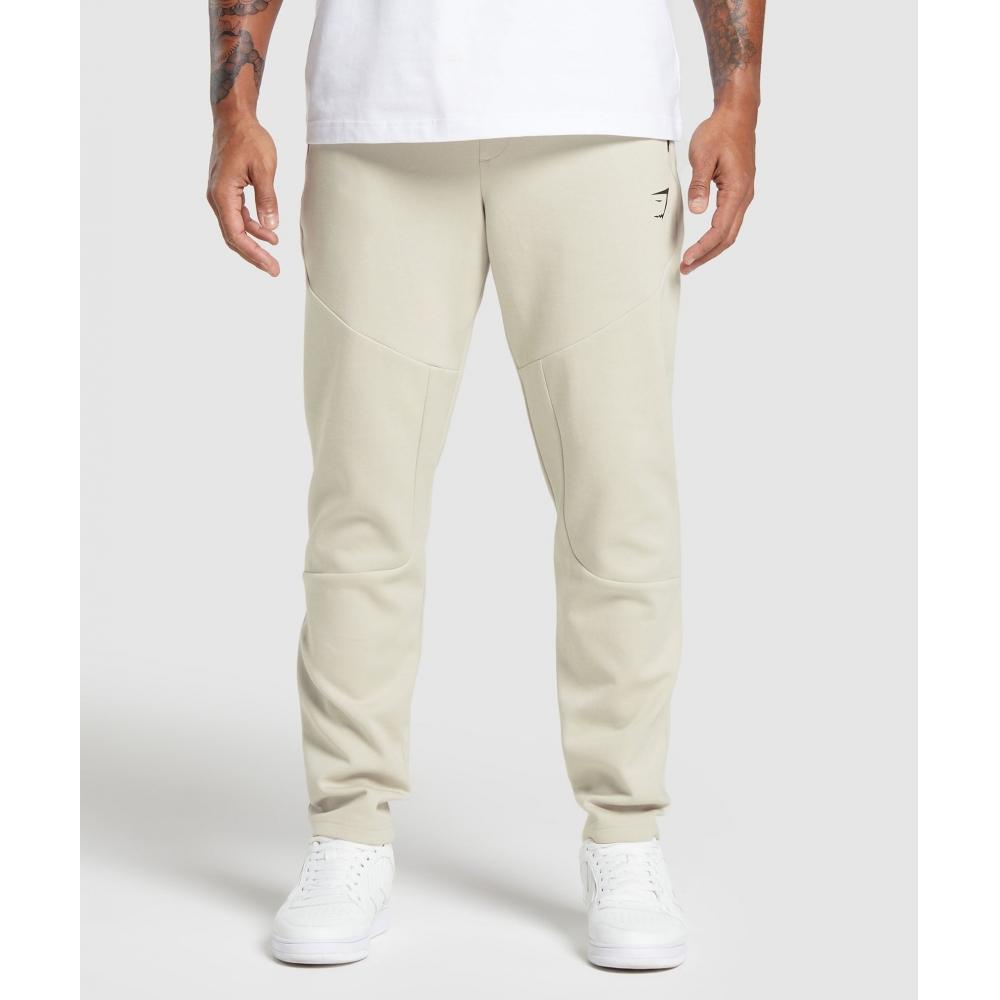 

Джоггеры GYMSHARK Interlock Tech Pebble Grey A5A4O GB7P