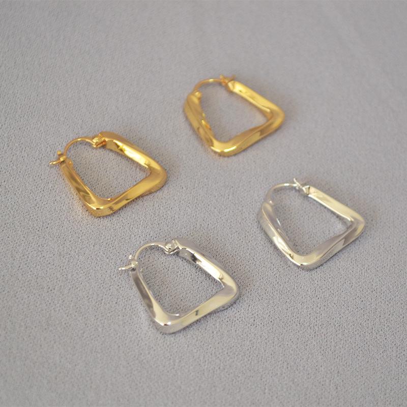INS Geometric Twisted Metal Triangle Earrings for Women.