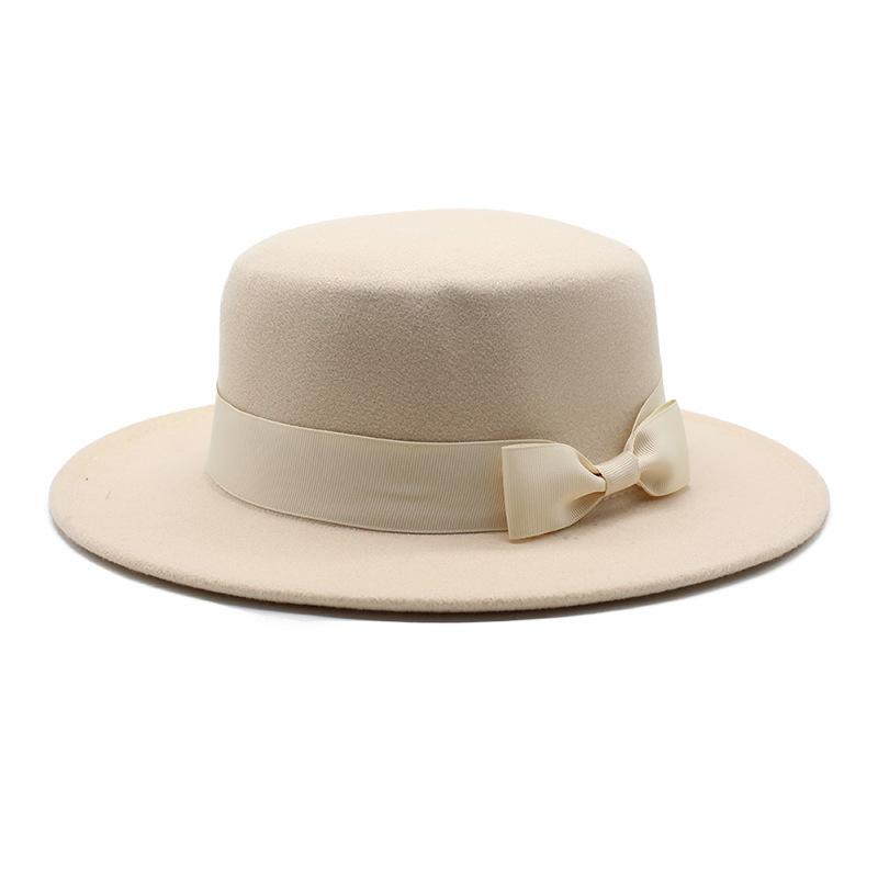 New style autumn and winter men's and women's flat-brimmed hats, fashion bows, flat-topped top hats, men's and women's woolen jazz hats
