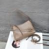 A new fashionable and versatile single-shoulder crossbody bag made of top-grain cowhide genuine leather, featuring a high-end and niche design