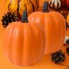 Celebratory Handcrafted Spume Pumpkin Decoration With Slanted Head And Mysterious Mood Lighting