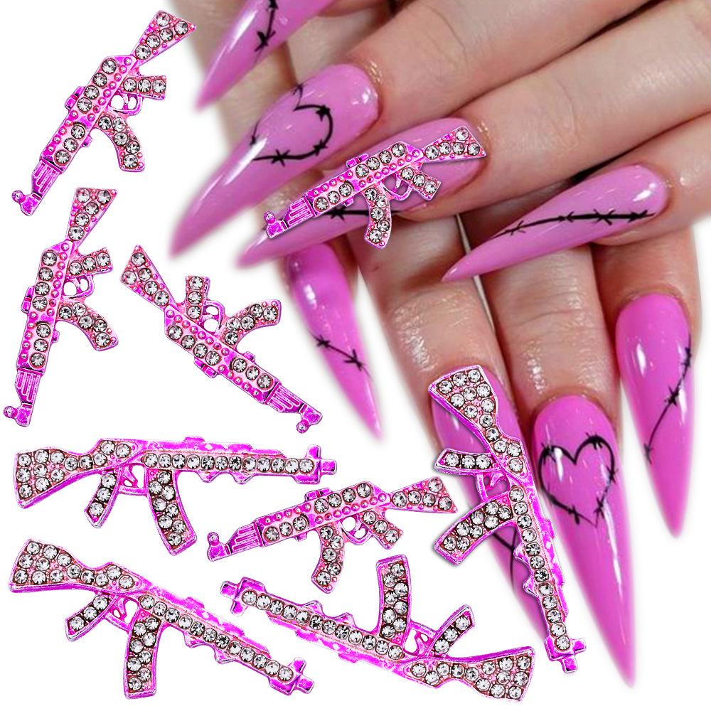 

Rhinestone-Encrusted 3D AK-Inspired Nail Art Decoration Gun Model золотой