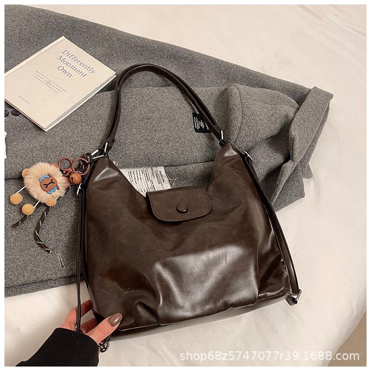 

High-end retro large-capacity bag women s 2025 new multi-functional commuter backpack shoulder tote bag темно-коричневого
