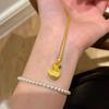 Vintage-Inspired Sand Gold Diamond Pendant Necklace: Luxurious Light Niche Design