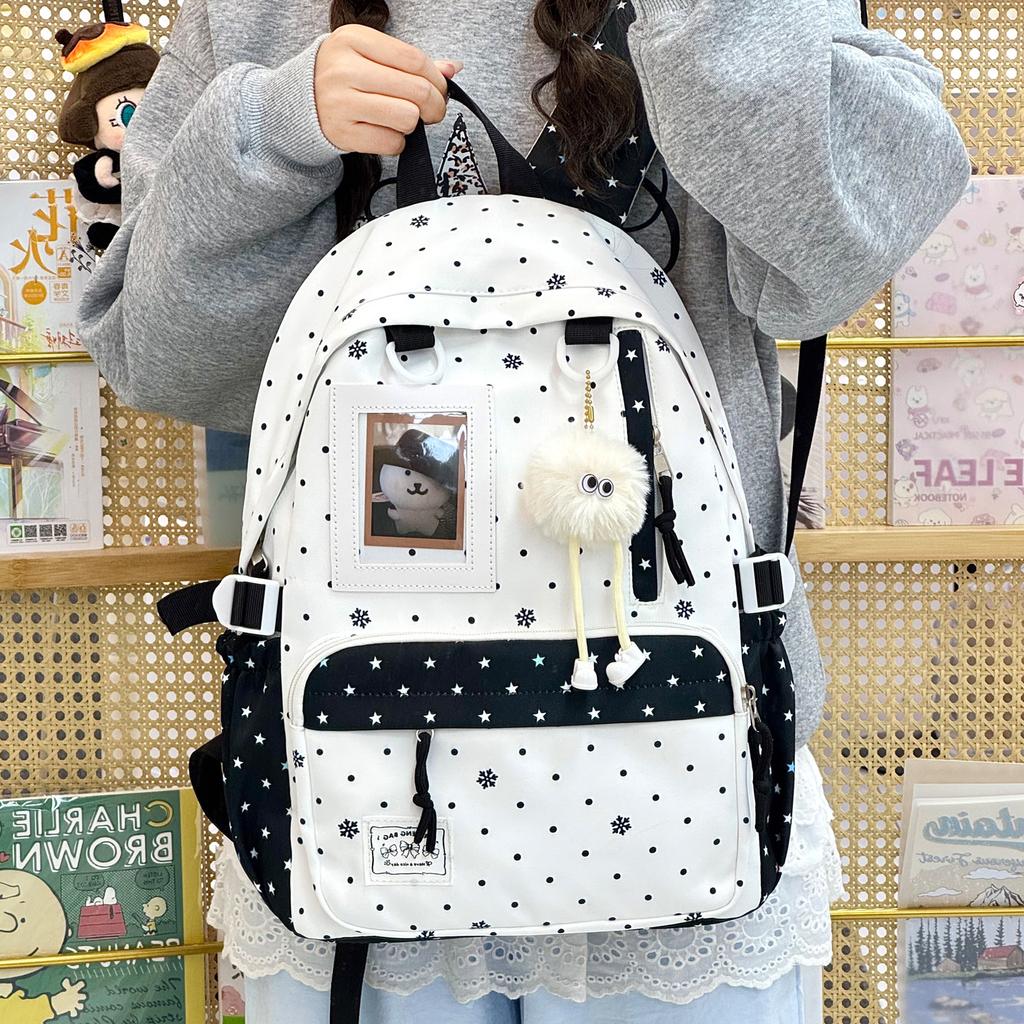 Schoolbag new high-value sweet and cute polka dot primary school backpack female volume two-dimensional transparent double shoulder pain bag