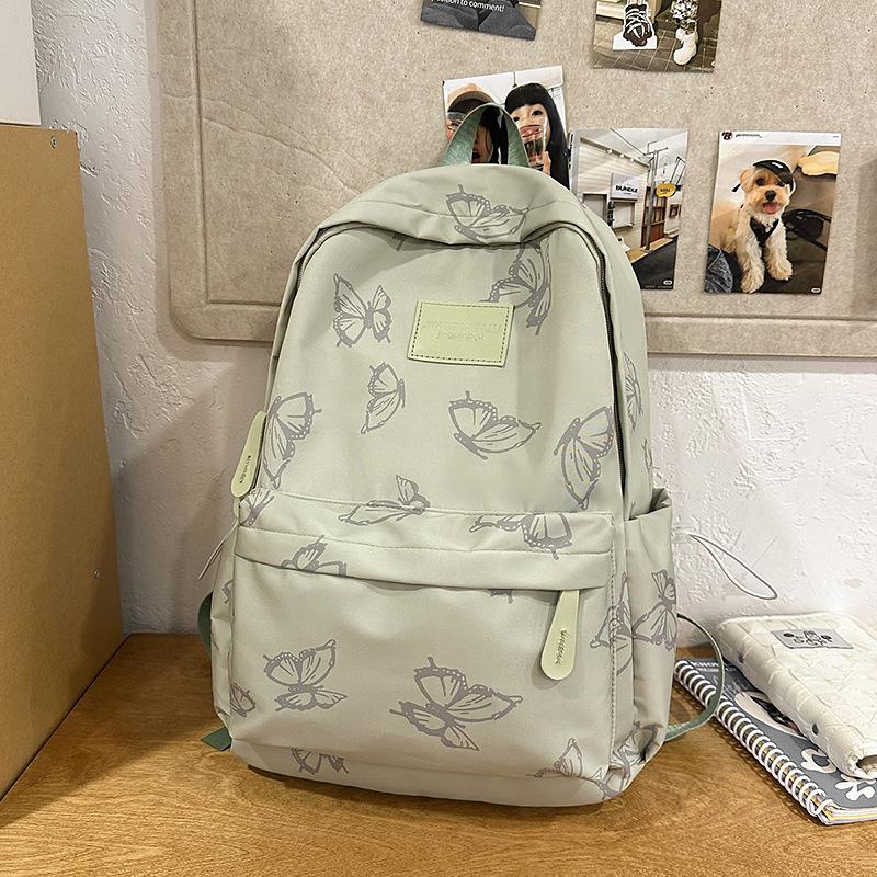 

Niche design butterfly backpack female versatile college student class bag leisure travel backpack computer bag зелёный
