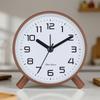 Simple modern alarm clock, creative pastoral large character silent round square bedside clock, student and children's alarm clock, metal table