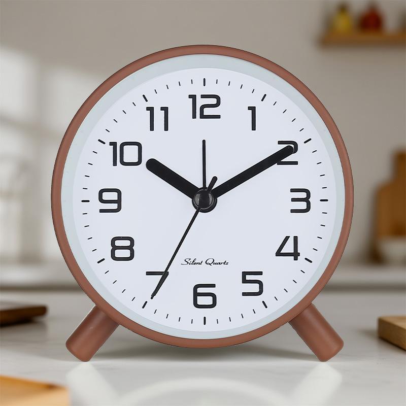 Simple modern alarm clock, creative pastoral large character silent round square bedside clock, student and children's alarm clock, metal table