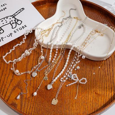 Light Luxury Tide Beautiful Handmade Beaded Pearl Chain Love Bow Dog Tag Creative Design Collarbone Chain Jewelry Women