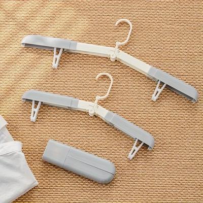 1PC Appendiabiti portatile da viaggio salvaspazio Appendiabiti in plastica pieghevole Pantaloni Calzini Gancio Organizzatore guardaroba multifunzionale