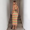 A Figure-hugging Knitted Long Dress for Women in Summer, Featuring A Revealing Back Design with Striped Patterns and A Fitted Bandeau Style.