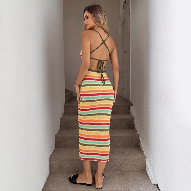 A Figure-hugging Knitted Long Dress for Women in Summer, Featuring A Revealing Back Design with Striped Patterns and A Fitted Bandeau Style.