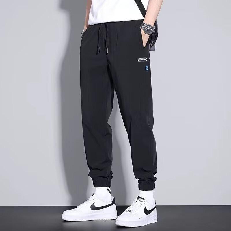 Men's casual pants elastic, loose, simple and comfortable, young students slim-fitting small feet and trousers