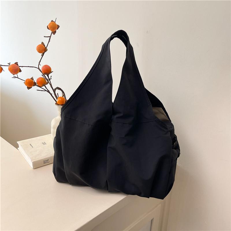 Модный тренд повседневная простая текстура большая вместимость сумка-тоут лето новый 2025 персонализированная женская сумка через плечо