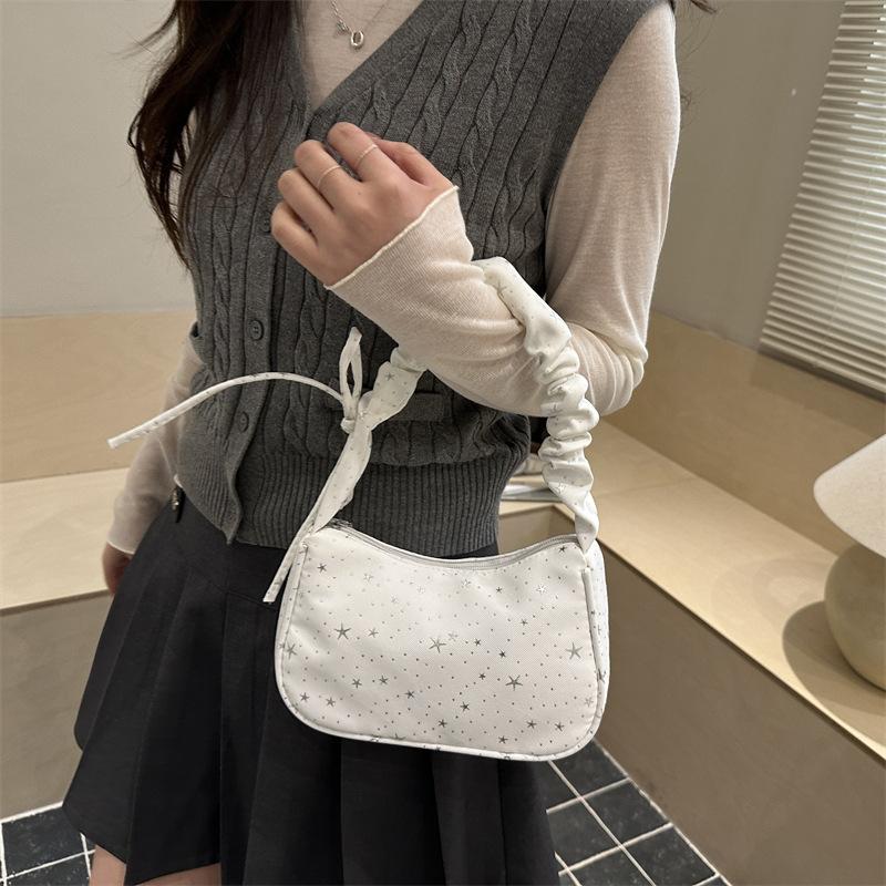 Nischen-Design Stern-Achseltasche Damen neue gefaltete Umhängetasche Pendlertasche High-End vielseitige Canvas-Tasche