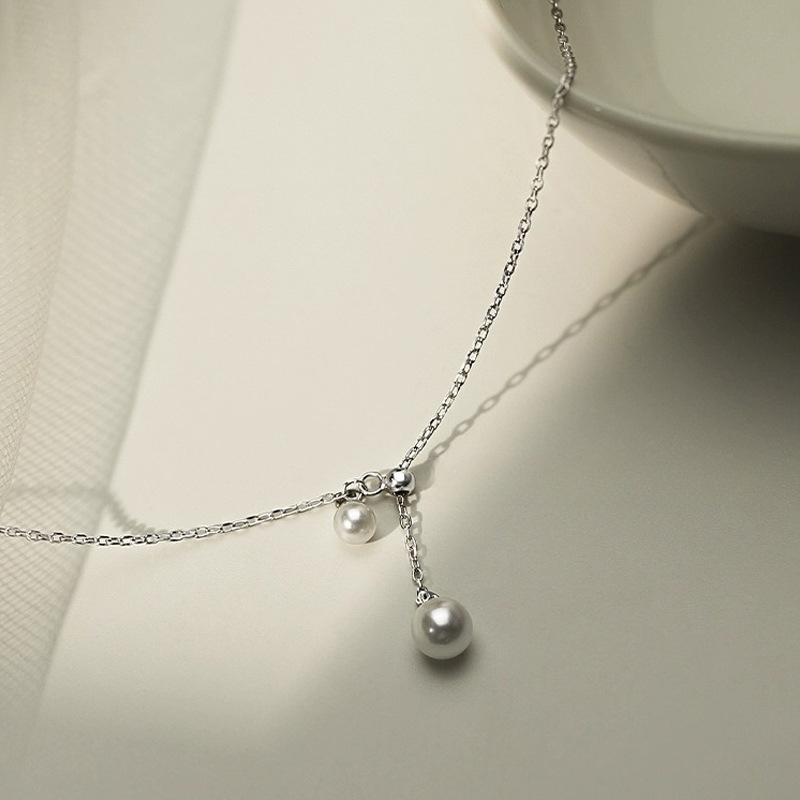 Pull pearl necklace female elegant retro high-end design sense ins cold style necklace female