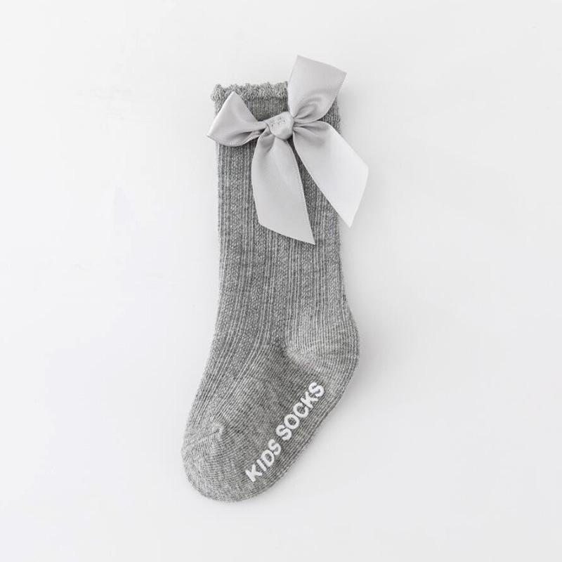 Chaussettes hautes en coton antidérapant pour nouveau-né avec nœud et rayures