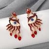 Red Evil Eye Tassel Earrings