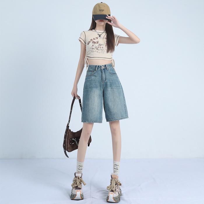 

Spring 2025 Women s High-Waisted Retro Blue Denim Shorts: Versatile Five-Quarter Length, Slimming Leather-Print Design for Longer-Looking Legs. Large