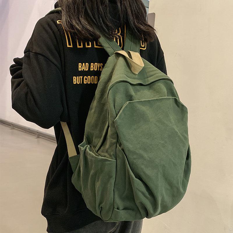 2025 Durable Canvas Solid Color Backpack for Female College Students - Korean and Japanese Style Travel Schoolbag