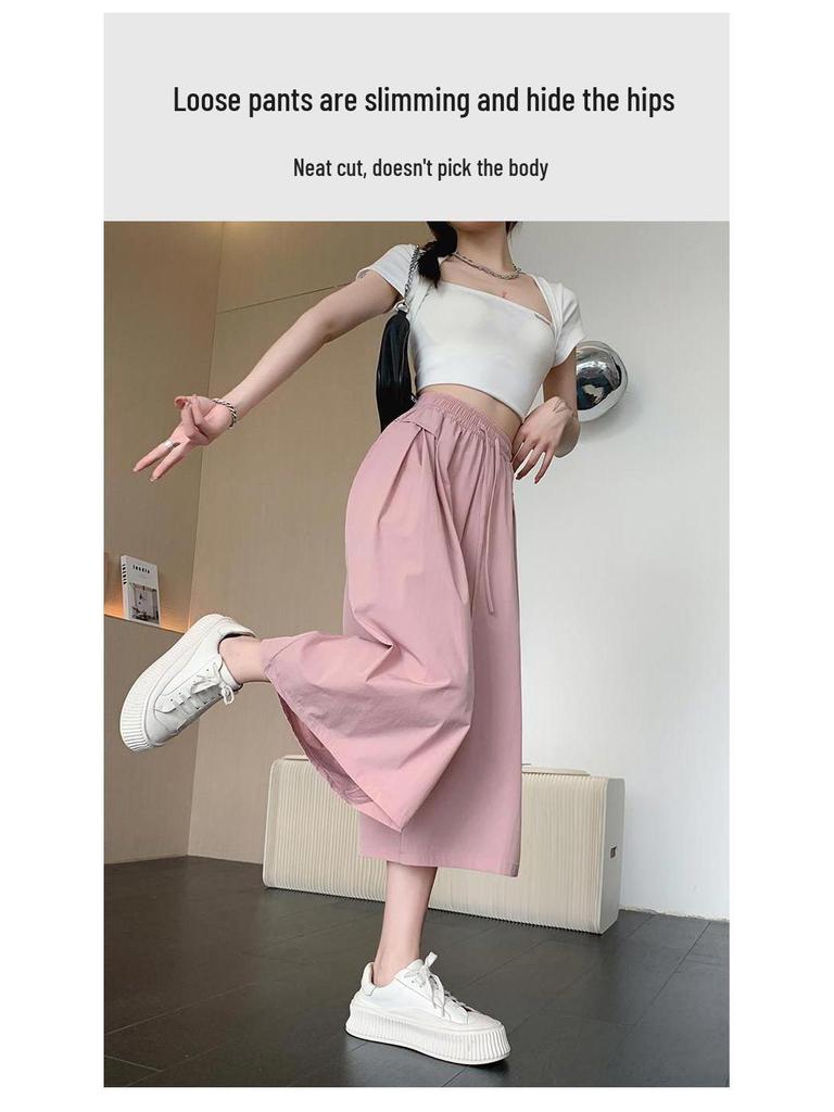 Ledové hedvábí Yamamoto culottes: Zeštíhlující, splývavé kalhoty se širokými nohavicemi na jaro/léto.