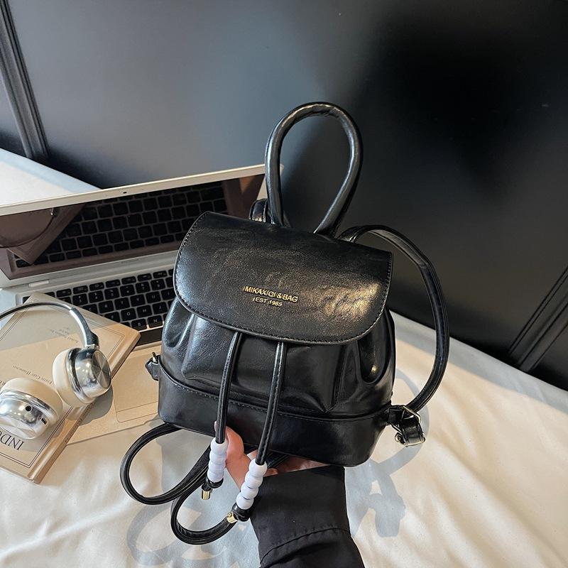 Trendy simple backpack new drawstring pleated women's bag going out travel small backpack