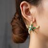 European & American Trendy Starfish Pearl Earrings In Green Gold for Women