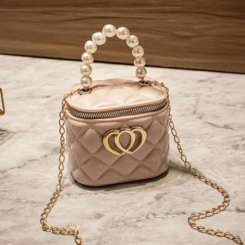 

Fashion bucket jelly bag lis hand double buckle heart-shaped decorative shoulder messenger bag абрикосовый