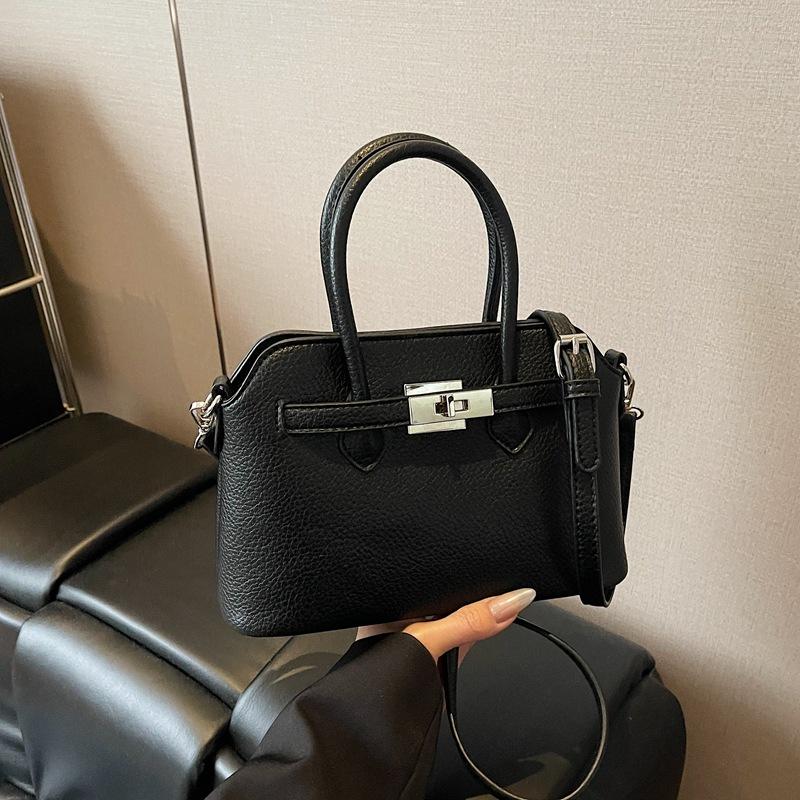 Simple temperament hand bag women's spring new niche fashion messenger bag commuter shoulder bag