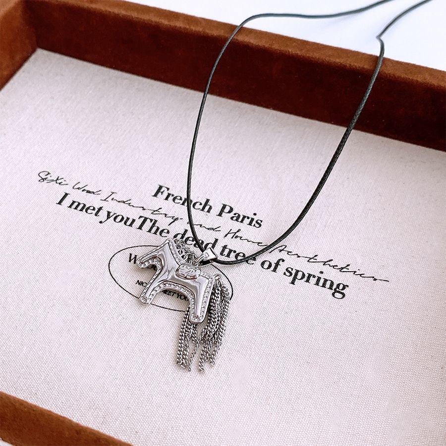 Retro Tassel Pendant Necklace - Trendy Cool Style for Unique Sweater Chain Look