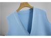 Completo estivo da donna con top lavorato a maglia senza maniche e pantaloni a gamba larga