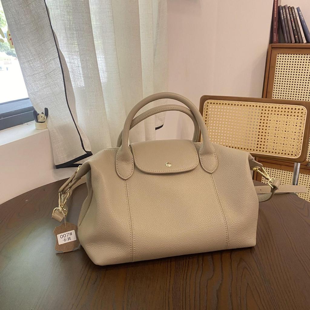 Japanese and Korean Soft Cowhide Handbag: Classic Women's Genuine Leather Dumpling Bag, Shoulder & Crossbody Style.